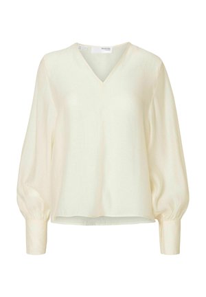 Crèmekleurige blouse met een V-hals, pofmouwen en een ontspannen silhouet. Gemaakt van lichtgewicht stof met een zachte textuur.