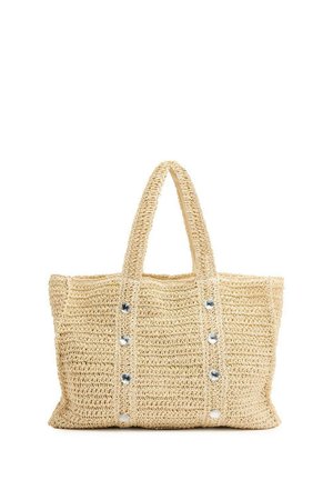 Sac en osier tissé avec deux poignées robustes, ornée de boutons décoratifs en métal argenté sur le devant et d'une finition en fibres naturelles texturées.