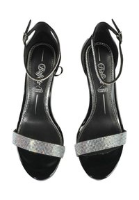 Sandale cu toc înalt negre, cu o curea decorată cu cristale, având un finisaj lucios și cataramă la gleznă, prezentând un design cu vârful deschis.