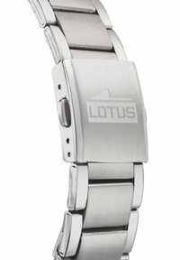Bracelet de montre en acier inoxydable argenté avec finition brossée, fermoir double verrou et logo "LOTUS" gravé sur le fermoir.
