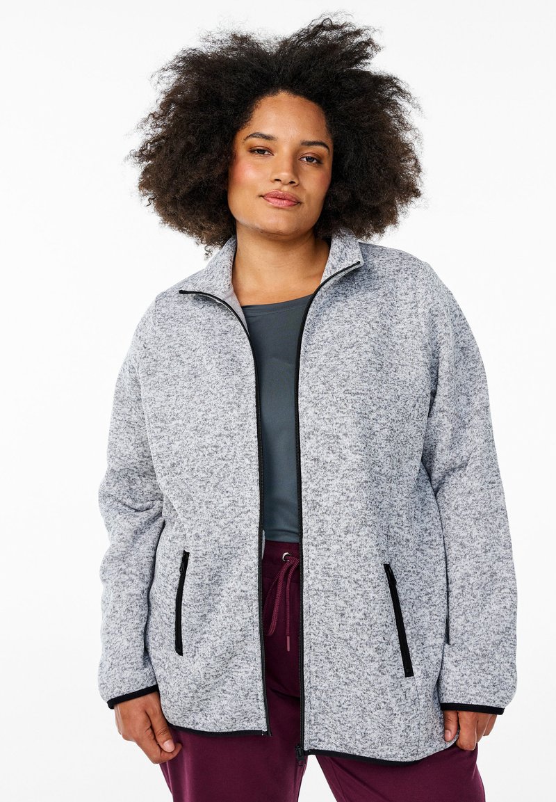 Grijze, met rits gesloten fleece jas met zwarte accenten, met zijzakken en een hoge kraag; lichtgewicht, gestructureerde stof.