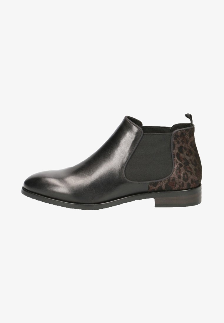 Bottine Chelsea en cuir noir avec panneau latéral élastique, contrefort de talon en tissu imprimé léopard, petit talon et languette de tirage à l'arrière.