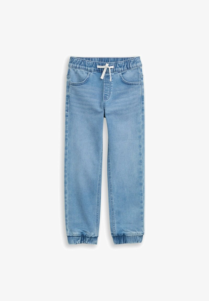 Jasnoniebieskie dresowe spodnie dżinsowe z elastycznym pasem, regulowanym sznurkiem i mankietami na nogawkach. Posiadają cztery kieszenie użytkowe.