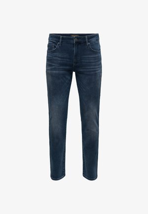 Tumši zili plāna piegriezuma džinsa džinsi ar priekšējām kabatām un pogu aizdari, ar smalkiem izbalēšanas un svītrojuma akcentiem.