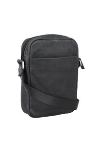 Svart kanvas crossbody-väska med dragkedja på toppen, frontficka och justerbar rem. Rektangulär form, texturerad yta.