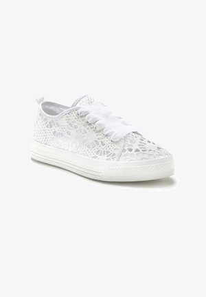 White lace sneakers with flat white laces, mesh upper featuring an intricate pattern, and a textured rubber sole with side grooves.