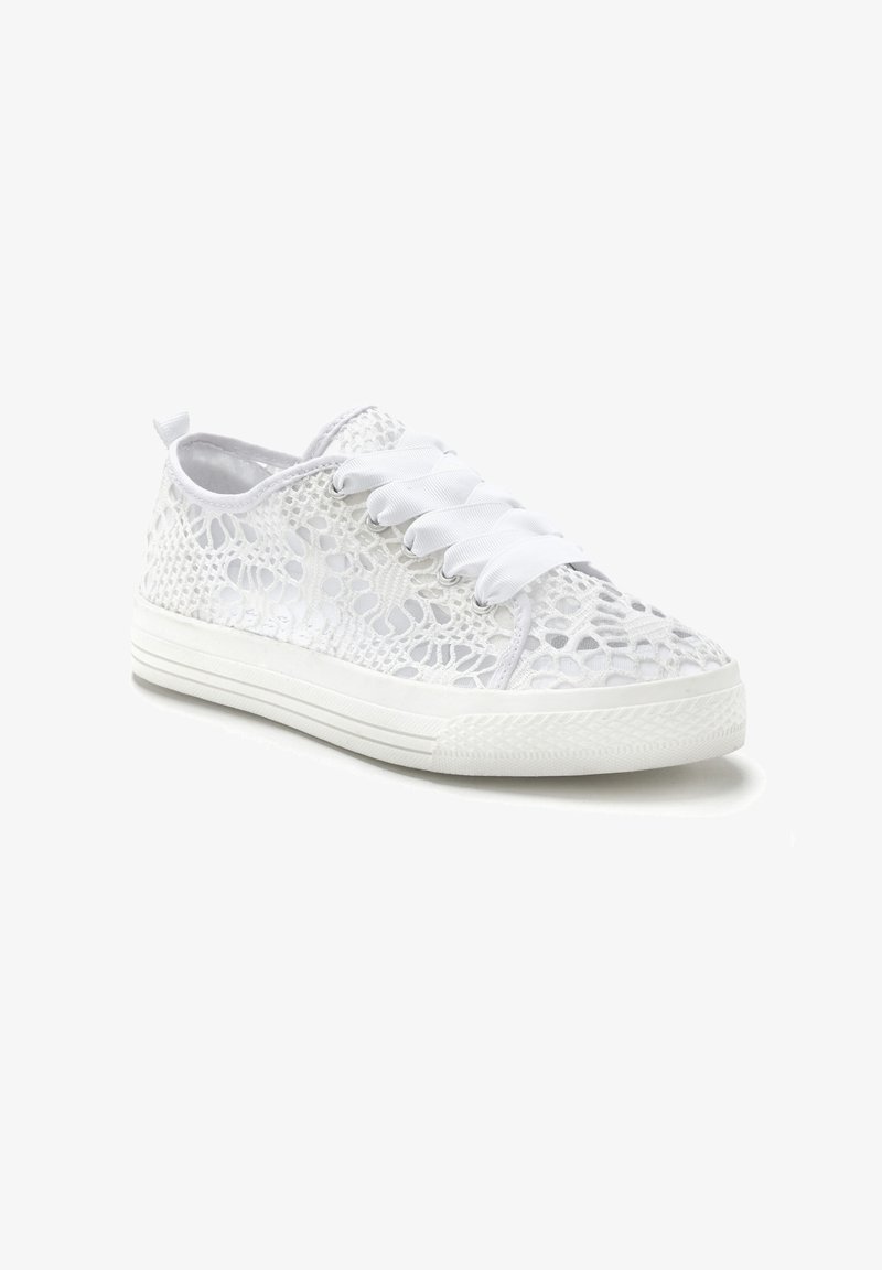 White lace sneakers with flat white laces, mesh upper featuring an intricate pattern, and a textured rubber sole with side grooves.