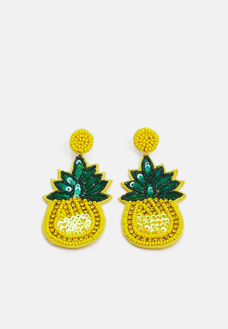 Dzelteni ananasa formas auskari ar zaļiem akcentiem, rotāti ar sekvīnām un pērļu darbiem. Apaļa dzeltena daļa ar teksturētu virsmu.