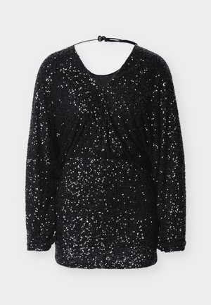 Μαύρο τοπ με παγέτες, μακριά μανίκια, ντεκολτέ σε σχήμα V και πιέτες στη μέση. Υφή με αντανακλαστικές παγέτες σε όλη την επιφάνεια.