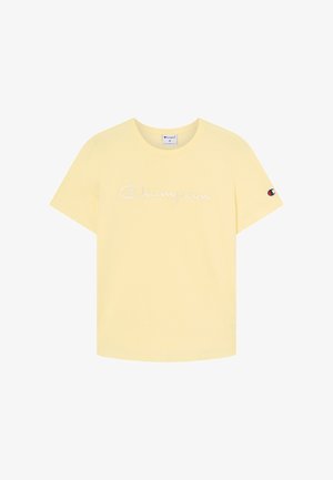 Lichtgele T-shirt met korte mouwen en een witte "Champion"-logo over de borst, met een klein Champion-embleem op de linkermouw.