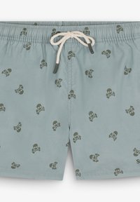 Costume da bagno in tessuto azzurro chiaro con un motivo all-over di teschi e ossa incrociate verde scuro e life con coulisse.