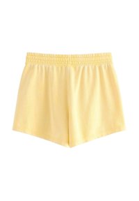 Shorts gialli in cotone con vita elasticizzata, caratterizzati da un design semplice e una superficie liscia, rifiniti con orli a taglio dritto.