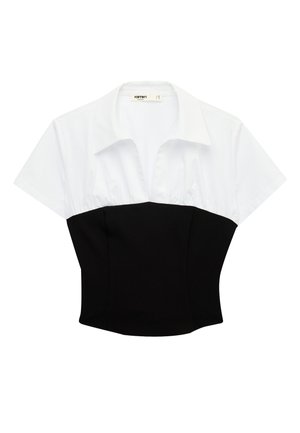 Haut à manches courtes avec partie supérieure blanche à col et partie inférieure noire ajustée façon corset.