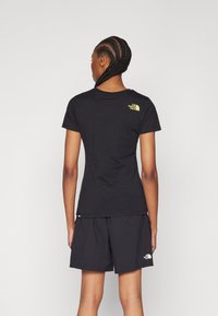 The North Face - T-shirt z nadrukiem