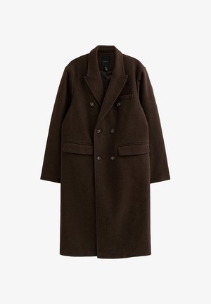 Bruine wollen overjas met een dubbelbreasted ontwerp, geperforeerde revers, twee voorzakken en een enkele borstzak. Glad textuur.