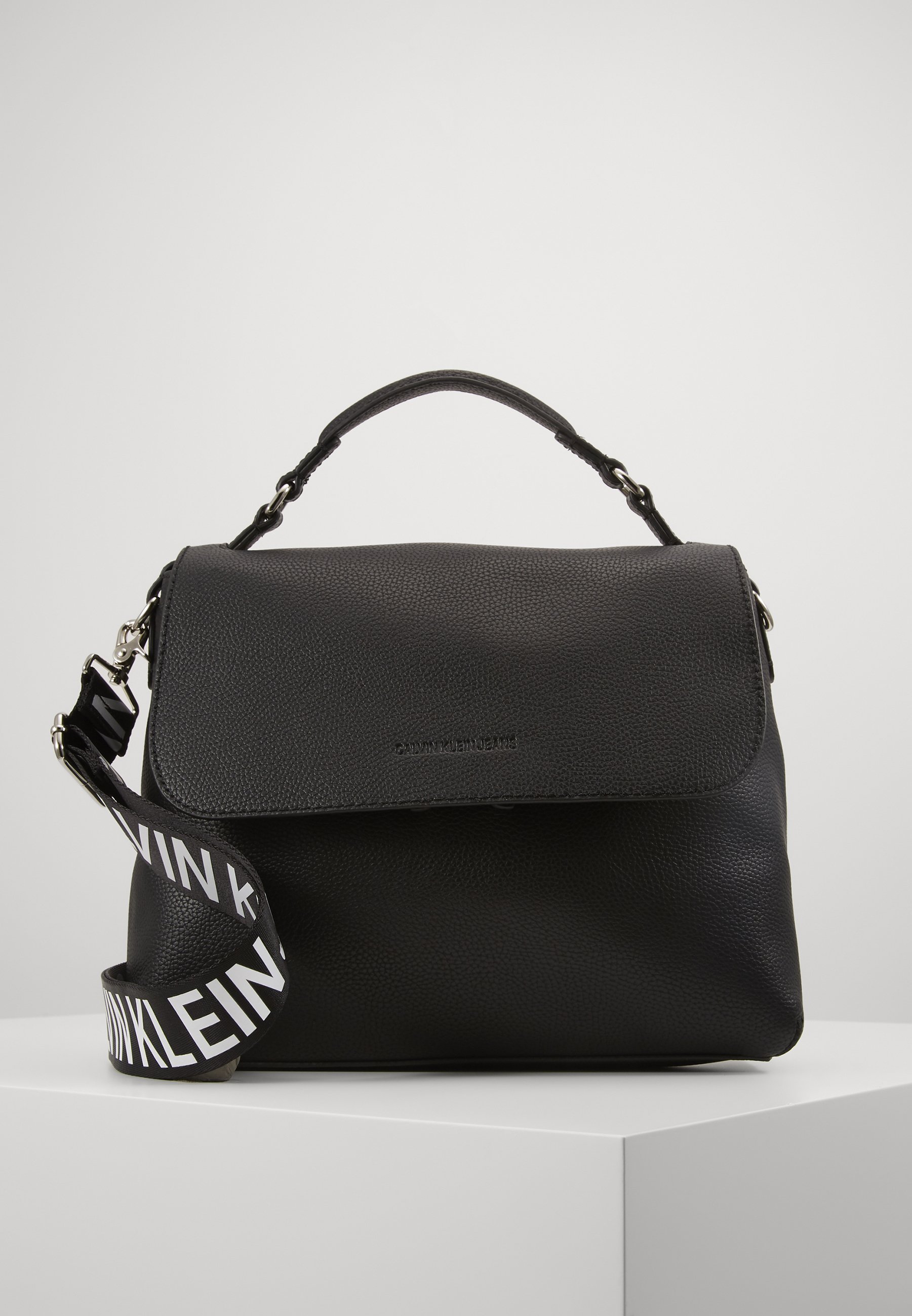 Calvin klein ultra light flap shoulder bag Clearance