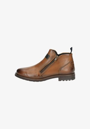 Stivali ankle in pelle marrone con una texture liscia, zip laterale e suola in gomma robusta. Presentano un manico sul retro per indossarli facilmente.