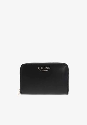 Sort Guess-pung med lynlås og sølvlogo "GUESS EST 1981" på forsiden samt sølv lynlås træk i venstre side.