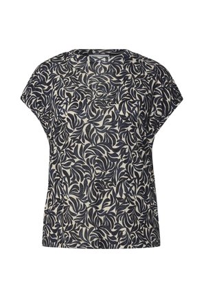 Luźna bluzka w granatowo-kremowy wzór liści, wykonana z lekkiego materiału, z krótkimi rękawami i okrągłym dekoltem.