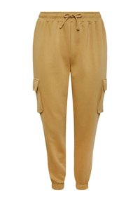 Ljust bruna sweatpants med dragsko i midjan, ribbad mudd och två sidofickor. Tillverkade av mjukt, slätt tyg.