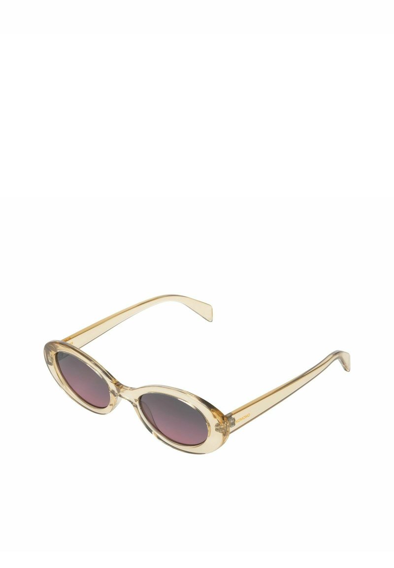 Transparante beige ovalen zonnebrillen met donkergetinte lenzen en slanke pootjes, gekanteld om de voor- en zijkant details te tonen.