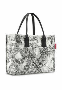 Schwarz-weiße Stofftasche mit Baumillustrationen, ausgestattet mit robusten schwarzen Tragegriffen und rechteckiger Form. Verstärkte Seiten für Langlebigkeit.