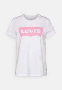 White cotton t-shirt featuring a large pink Levi's logo centered on the front. Short sleeves and a crew neck design.