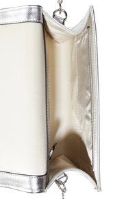 Silver metallic clutch with a smooth texture, featuring a satin interior, a single compartment, and a chain handle for easy carrying.