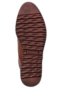 Brązowa gumowa podeszwa z teksturowanym wzorem falistym. Gładkie krawędzie i wytłoczone logo są widoczne w pobliżu pięty. Płaski design zapewniający przyczepność i trwałość.