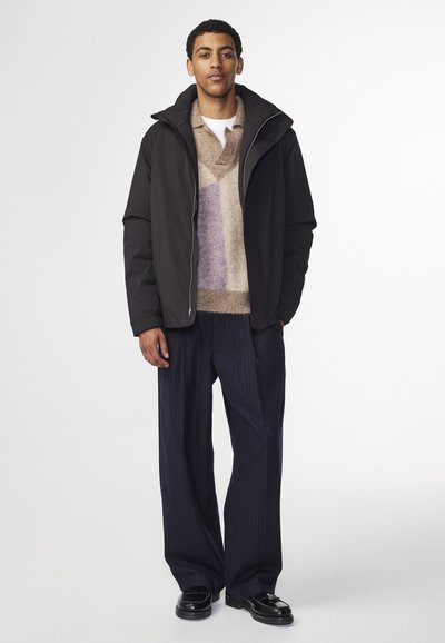 NN.07 SKIPP - Jas - black