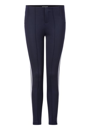 Leggings bleu marine en tissu lisse et extensible. Dotés de bandes latérales blanches contrastantes et d'un design ajusté. Comprend des poches latérales.