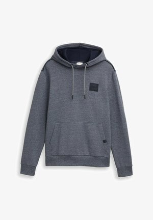 Šedá mikina vyrobená z měkké tkaniny, s přední kapsou, kapucí se šňůrkou a zdrsněnou černou nášivkou na hrudi. Jednoduché manžety.