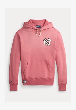 Lichtroze hoodie met een kangoeroezak, geribbelde manchetten en een geweven label. Voorzien van een marineblauw NY-logo op de borst. Gemaakt van een katoenmix.