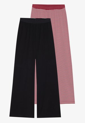 Divi platai bikses: viens ciets melns ar gludu tekstūru un otrs ar sarkaniem un baltajiem vertikālajiem svītrainajiem rakstiem, abiem ir elastīgas jostas.