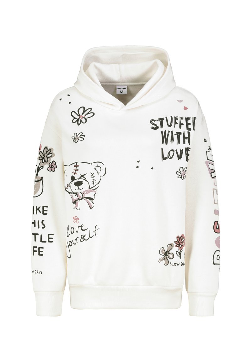 Witte hoodie met grafische ontwerpen van een beer, bloemen en tekst. Zacht materiaal met geribde manchetten en zoom, casual pasvorm.
