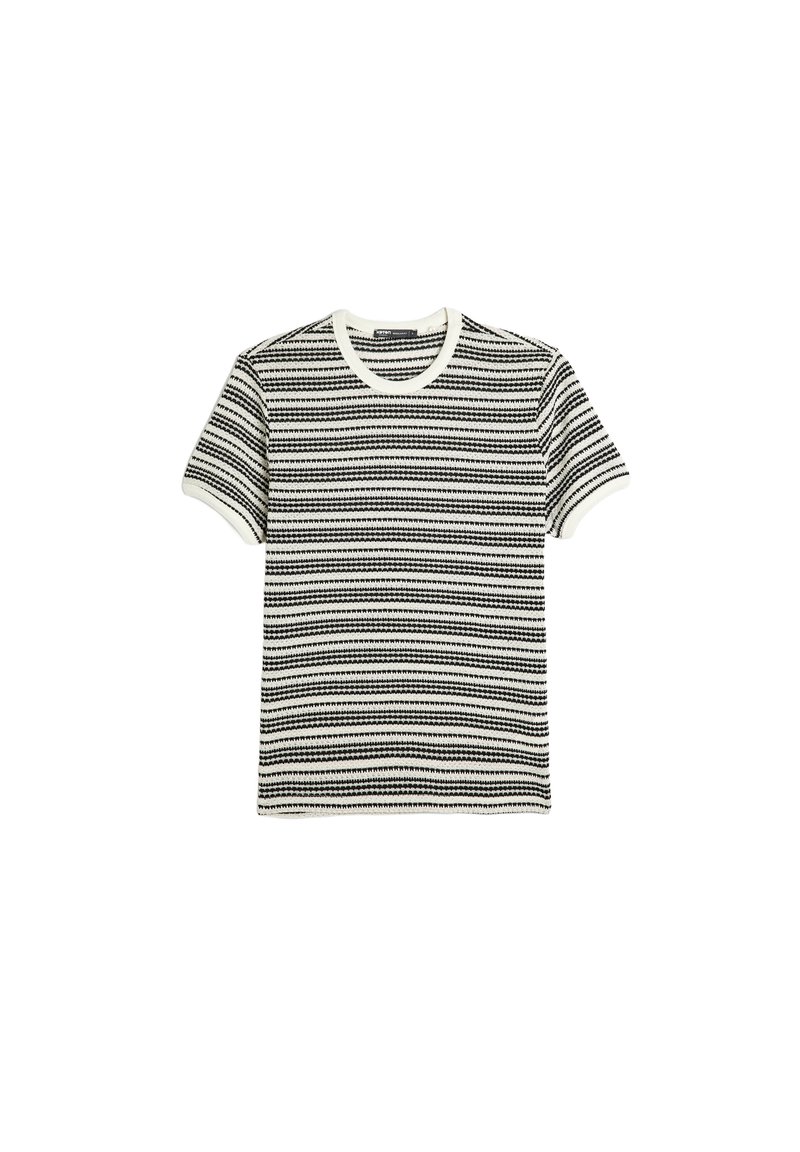Camiseta de rayas en blanco y negro con mangas cortas, escote redondo y un diseño de punto texturizado. Acentuada con bordes ribeteados en blanco.