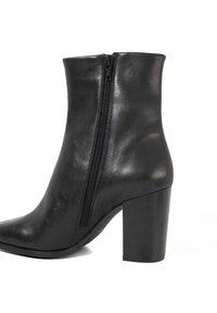 Black leather ankle boot with a pointed toe and a chunky heel, featuring a side zipper and a smooth, glossy texture.