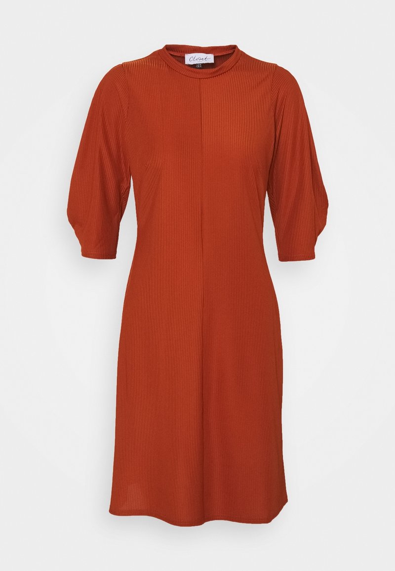 Robe côtelée orange rouille avec manches courtes bouffantes et encolure ronde, longueur genou, présentée sur un fond clair uni.