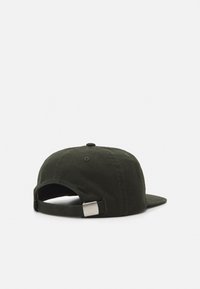 Khaki cotton baseball cap with a flat visor, adjustable fabric strap, and a silver buckle, featuring six ventilation holes and a rounded crown.