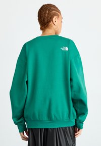 The North Face ESSENTIAL OVERSIZE CREW - Pusa - evergreen