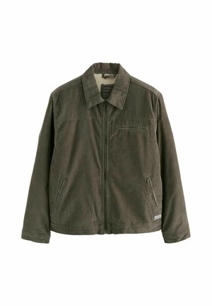 Olijfgroen corduroy jasje met frontrits, twee zijzakken, een borstzak met rits en een zachte binnenvoering die zichtbaar is bij de kraag.