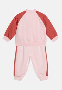 Nike Sportswear E1D1 HALF ZIP SET - Trousers - pink foam