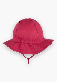 Rosa Bucket Hat mit einer runden Krone, breiter, fransiger Krempe und verstellbarem Kinnriemen. Hergestellt aus einem Stoff mit glatter Textur.