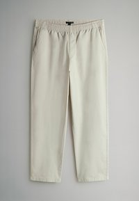 Pantalones beige claro con cintura elástica, que cuentan con dos bolsillos laterales y un diseño de pierna recta. Hechos de una tela lisa y ligera.