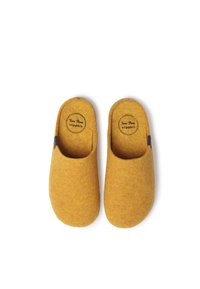 Yellow felt slippers with a smooth texture, open back design, and a small logo on the insole. No visible hardware or accents.