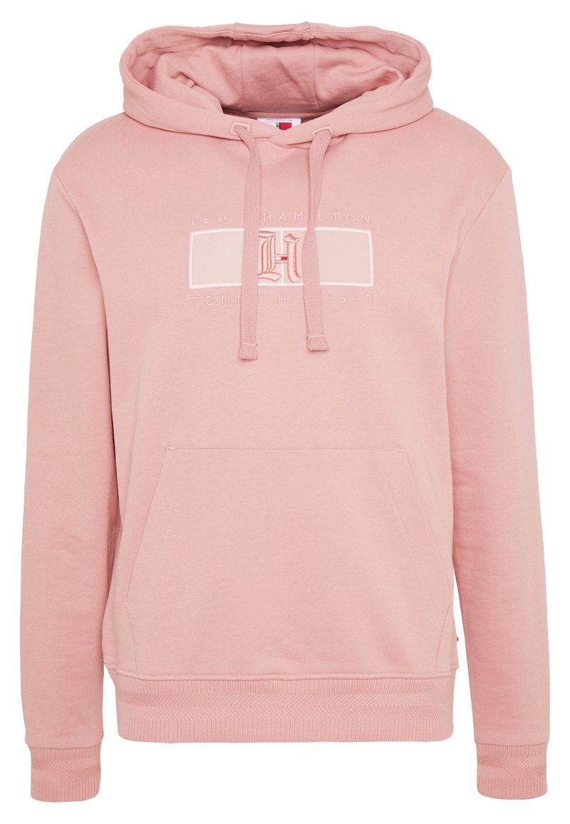 Sudadera con capucha rosa hecha de un tejido suave. Cuenta con un bolsillo frontal y cordones, con un detalle de logo bordado en el pecho.