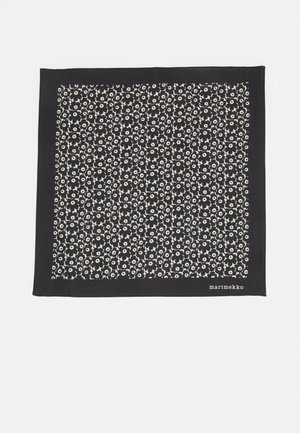 Black patterned scarf featuring a white floral design, made of soft fabric, square shape with branded corner detail.