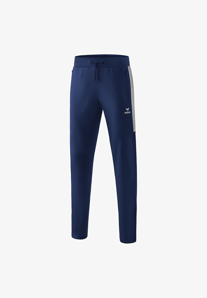 Marineblauwe sportbroek van glad polyester, met een trekkoord in de taille, zijzakken met rits en contrasterende witte zijpanelen.