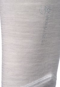 Lys grå leggings med blødt, struktureret stof. Inkluderer et diskret logo på siden og flade sømme for komfort.