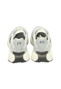 Gray athletic shoes featuring a smooth and textured upper, with numbers 19 and 49 on the heels, and a contrasting black rubber sole.